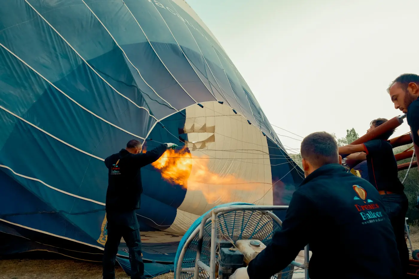 Ground crew inflating a hot air balloon